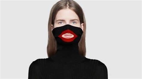 gucci blackface turtleneck.